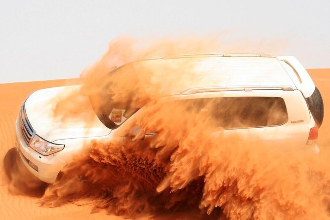 Morning Dubai Desert Safari with Sand boarding and Camel Ride - Riding Out in a Licensed Land Cruiser Guide Setup