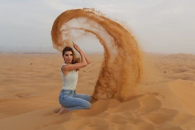 Morning Dune Bashing with Camel Trekking and sand boarding - Sandboarding and Photo Moments: Free Sliding Time