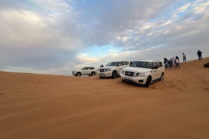 Morning Red Dune Desert Safari Camel Ride and Sandboarding - Price and Value: Is $36.29 a Good Deal for This Much Desert Fun?