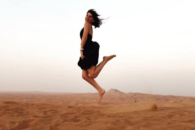 Morning Red Dunes Safari: Camel Ride & Sandboarding Adventure - Sandboarding on Red Dunes: Sliding Down, No Overthinking