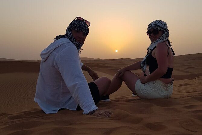 Morning Thrilling Dune bashing , Send Boarding & Camel ride - Camel Ride: The Classic Contrast to the Red Dune Chaos