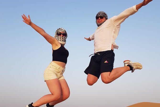 Morning Thrilling Dune bashing , Send Boarding & Camel ride - Price and Value: $250 Per Group That Stays Private