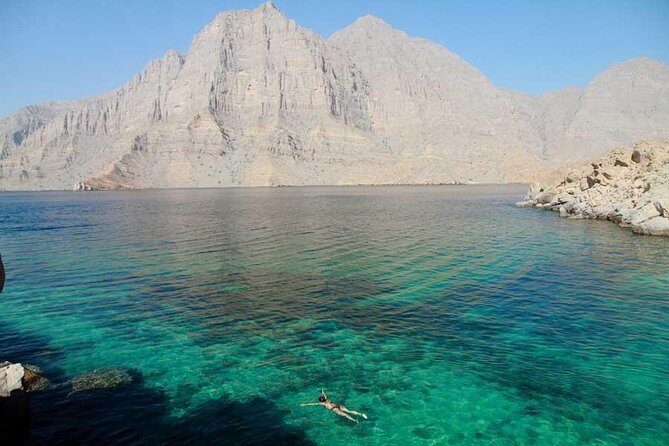 Musandam Khasab Day Trip and Dhow Cruise from Dubai - Telegraph Island snorkeling stops: swimming with gear already provided