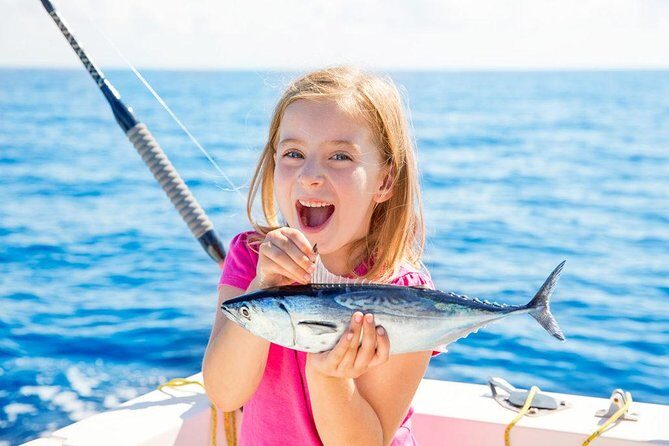 Nanje Fishing Trips Dubai - Onboard setup: fishing gear, towels, sound system, and BBQ