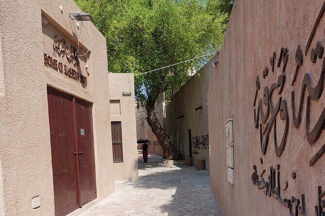 Old Dubai Walking Tour with Local/souks, boat, and local tasting. - Stop 4: Textile Souk for Fabrics, Scales, and What Changed