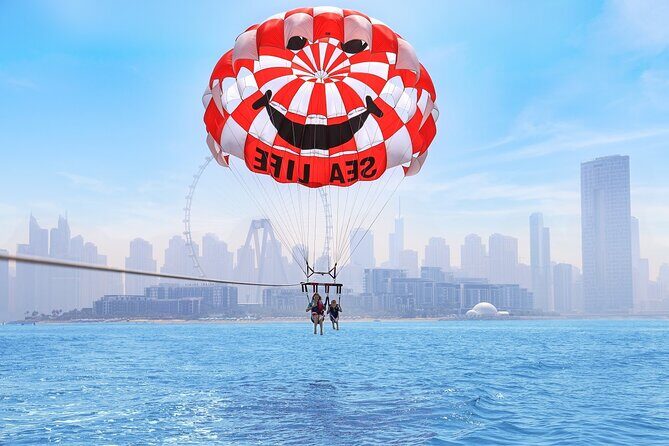 Parasailing in Dubai with Palm Jumeirah and JBR Beach views - What It Feels Like When You’re Harnessed and Lift Off