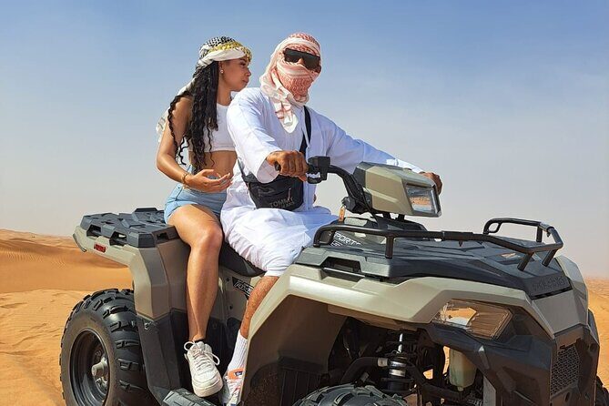 Polaris 570cc (4x4 )Quad Bike Ride +Sand Boarding- Red Dunes - Camel ride and the Arabic lounge stop: the tradition break that doesn’t feel like a detour