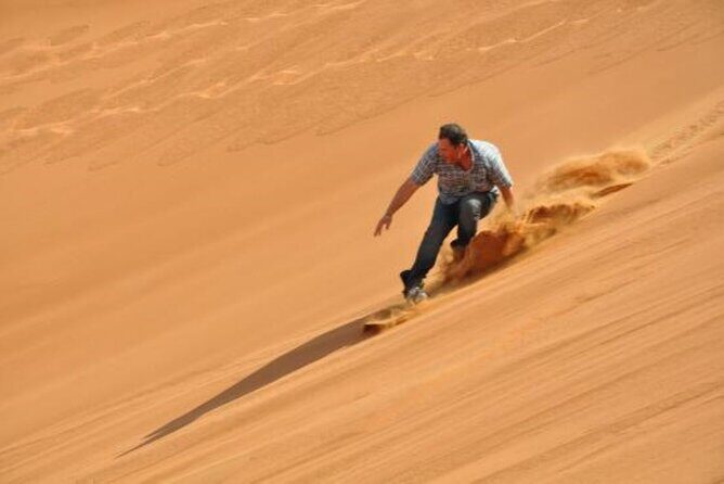 Polaris 570cc (4x4 )Quad Bike Ride +Sand Boarding- Red Dunes - Who should book this quad + sandboarding + camel combo