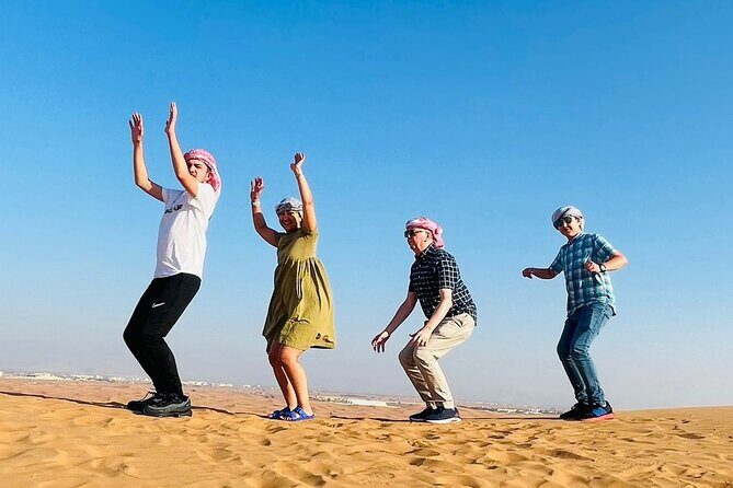Polaris Dune Buggy Adventure on Dubai's Open Red Dunes - Photos, sandboarding, and camel riding in the desert middle