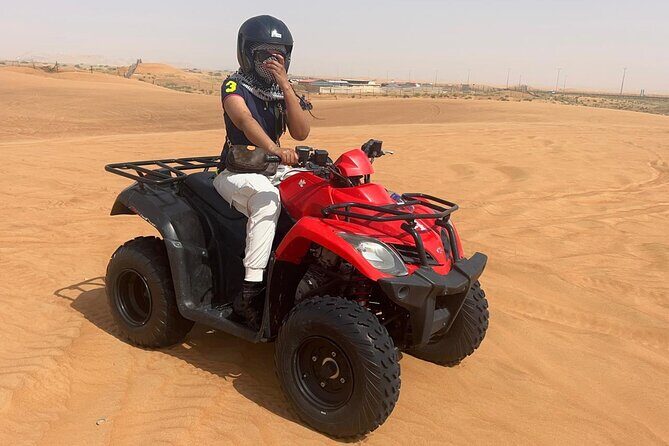 Premium Desert Quad (ATV) Bike Ride Adventure & Sand boarding - Camel meet, Gahwa, and falcon photos before you hit the dunes