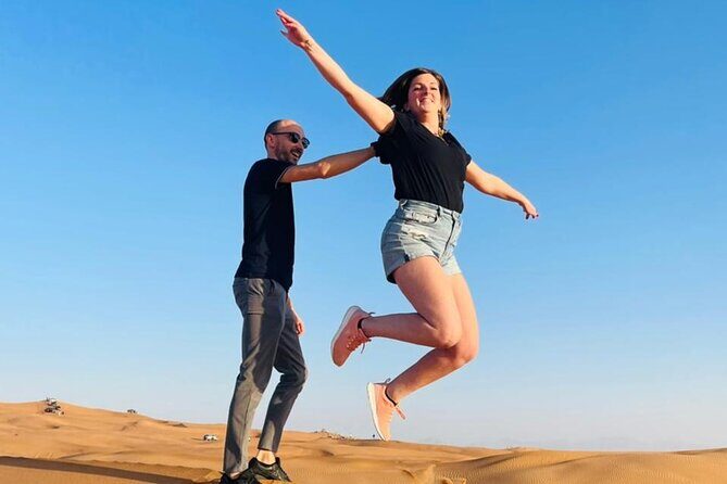 Premium Desert Safari Dubai : Dune Bashing, Camel Ride with BBQ - The Camp Dinner Scene: BBQ, Drinks, Henna, and Shisha
