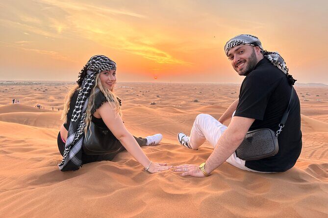 Premium Desert Safari Dune Buggy Camel Ride Sandboard & BBQDinner - Dune Bashing and the High-Dune Sunset Photo Stop