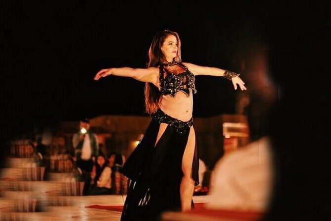 Premium Desert Safari with Dinner, Dunes and Ten Shows (VIP) - Camel ride and sandboarding: How the tour slows down at the right time