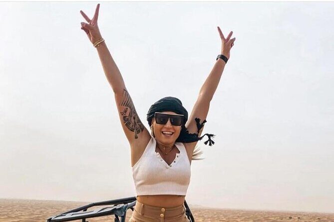 Premium Desert safari With Dune buggy camel ride BBQ dinner - Al Awir camp time: camel ride, sunset views, and live entertainment