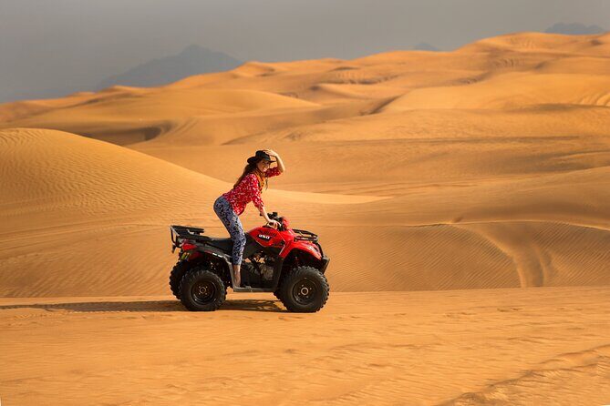 Premium Dubai Red Dunes with quadbike, camel ride and VIP Dinner - Quad Bike and Sandboarding: 25 Minutes of Real Riding Power