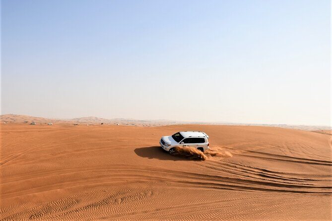 Premium Red Dunes Bashing with Quad Bike, Camel, Falcon &VIP Camp - Quad Bike + Dune Bashing: Real Adrenaline, Clear Instructions