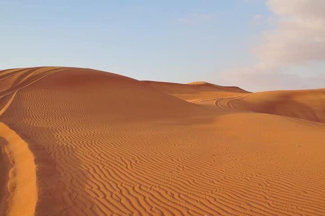 Premium Red Dunes Safari and Camel Safari with BBQ Dinner - Sunset sand: why the timing is worth it