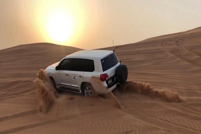 Premium Sundowner Red Dunes & Camel Safari with BBQ Dinner - What Happens After the Dunes: Camels, Sandboarding, and Camp Time