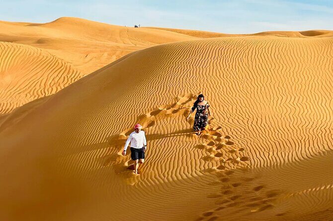 Private 4Hours Red Dunes Safari Camel Ride ,Falcon & Dune Thrills - Sandboarding on the dunes: fun for all skill levels (and yes, you’ll get sandy)