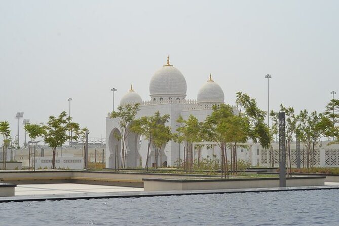 Private Abu Dhabi 5 Wonders Tour with Emirates Palace Lunch - Ferrari World and Yas Island Photos: Fun Contrast Without Extra Tickets