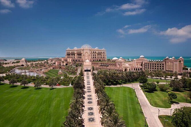 Private Abu Dhabi City Tour From Dubai With Guide - Etihad Towers: quick views, quick photos, no ticket included