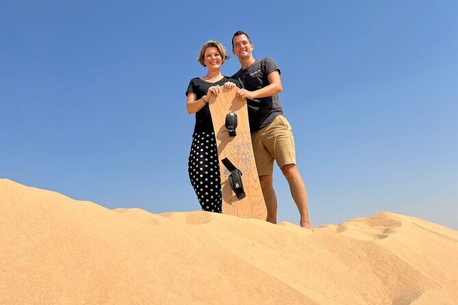 Private Abu Dhabi Sunset Desert Safari with Sand Boarding - Dune Bashing With Your Marshal, Then Sandboarding Runs