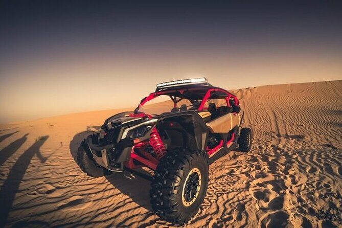 Private Can-am Maverick X3 Turbo Driving in Dubai - Getting suited up: helmets, water, and what the guide’s doing for you