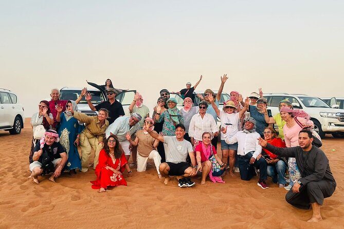 Private Car: Evening Desert Safari with BBQ Dinner - Stop 2 in Lahbab: Red Dunes, Dune Bashing, and Sandboarding Under Sunset Light