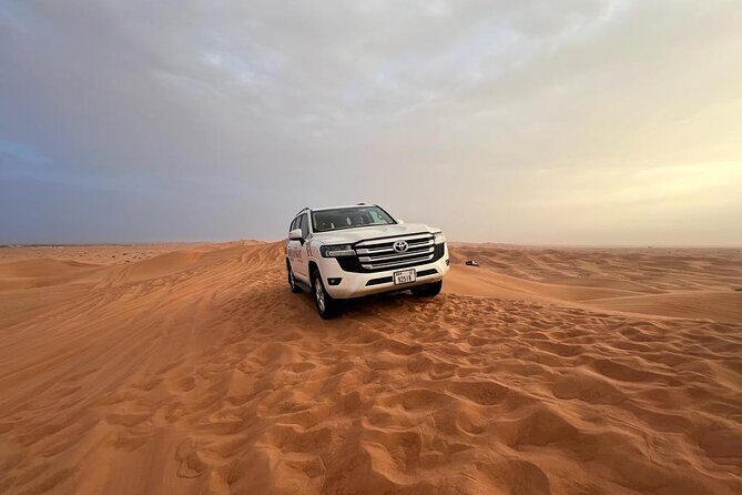 Private Desert Safari Dubai Tour With Dune Bashing and BBQ Dinner - From 2:30 pm Pickup to Red-Sand Tires: How the Evening Starts