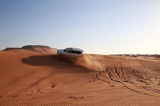 Private Desert Safari Tour With Dune Bashing in Dubai - Sandboarding at Night: The Cool-Weather Payoff