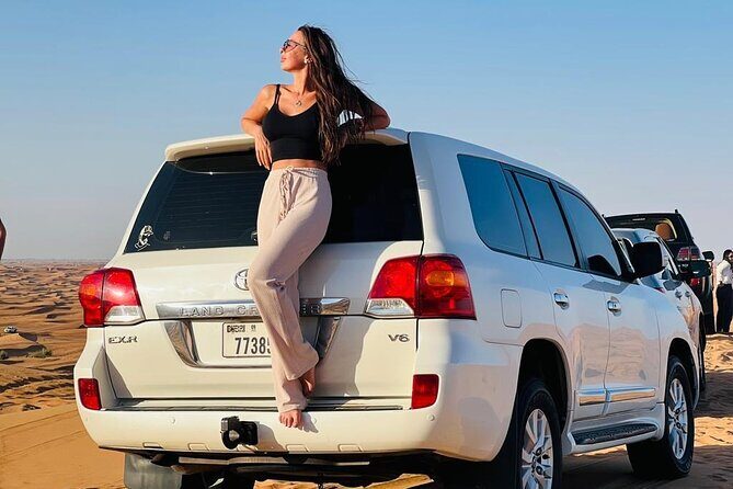 Private Desert Safari With BBQ Buffet Dinner And Live Shows - Sunset picture stop on high dunes: this is where the guide matters