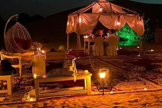Private Dinner in the Heart of the Desert with Entertainment show - Lahbab Bedouin camp: Sand boarding and camel ride without the chaos