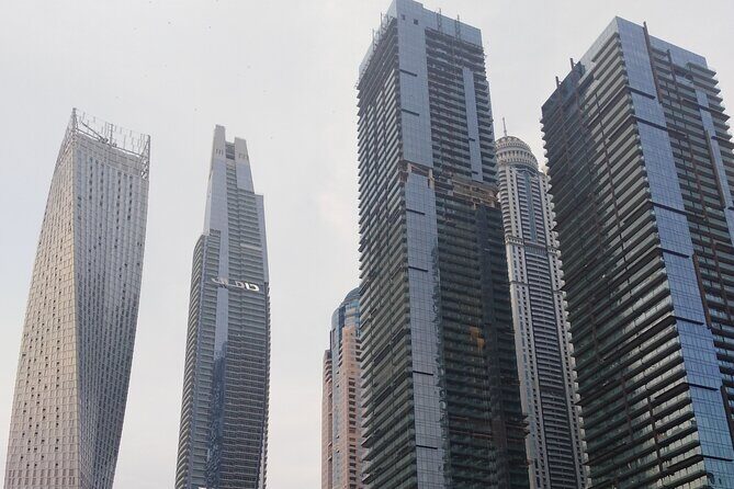 Private Dubai 4 hours Tour with Guide and driver - Dubai Marina glimpse: a skyline hit without the day-long commitment