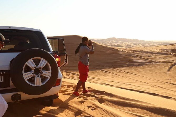 Private Dubai City Tour and Dinner in the Desert Safari - Desert dune bashing and sand boarding: the high-energy part