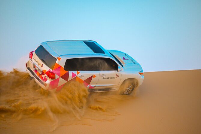 Private Dune Bashing in Abu Dhabi - Morning Desert Safari - The camp break: sandboarding, camel ride, and that calm moment between runs