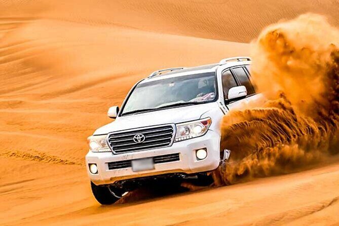 Private Evening Desert Safari Dubai with Camel Riding & BBQ - Entertainment lineup: belly dance, Tanoura, and the fire show