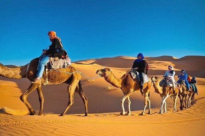 Private Evening Desert Safari with BBQ Dinner Dubai - The Bedouin camp welcome: tea, dates, henna, and photos