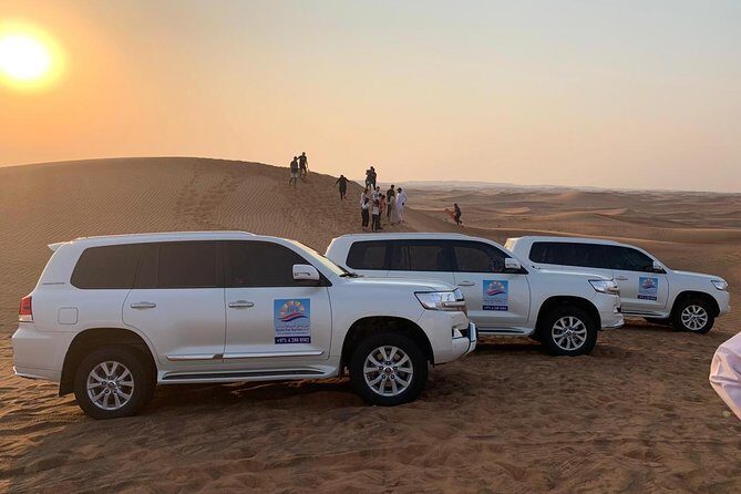Private Evening Desert Safari with BBQ Dinner & Sand Boarding - Lahbab red dunes: 35 minutes of dune bashing plus sand boarding
