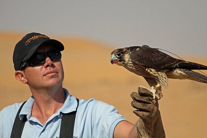 Private Falconry Experience and Nature Desert Safari in Dubai - Holding Owls and Learning Bird Behavior