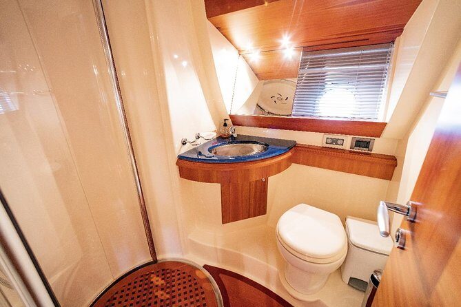 Private Luxury Yacht Cruise for up to 20 people - Atlantis on Palm Jumeirah: That Peach-Color Icon and the Arch for Photos