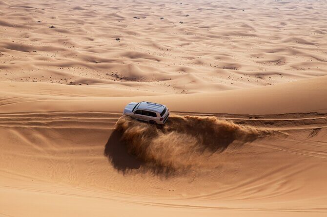 Private Morning Desert Adventure: Sandboarding & Camel Ride - Camel ride: the calm counterpoint after the bumps