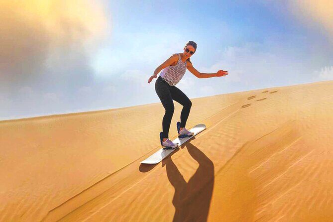 Private Morning Desert Adventure: Sandboarding & Camel Ride - Photo stops, falcons, and the small comfort details