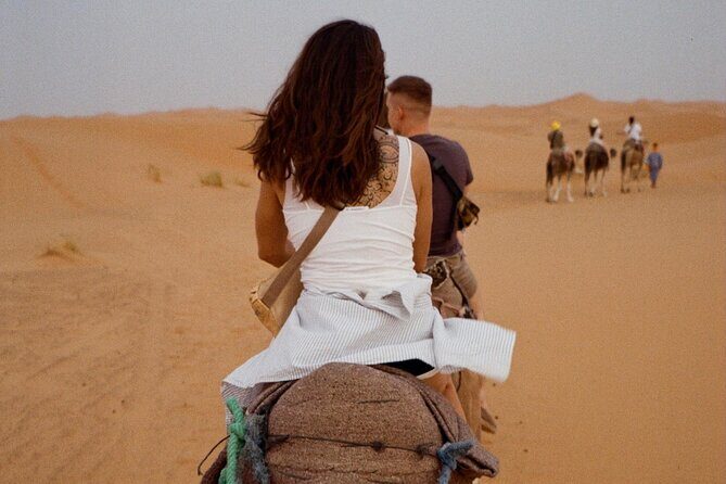 Private Red Dunes Safari with BBQ Dinner and Camel Riding - Sandboarding and henna: two hands-on stops, one photo-ready vibe