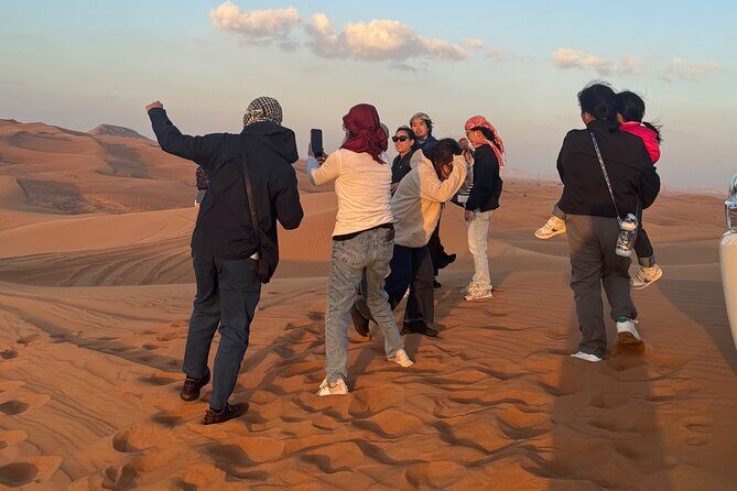 Private RedDune Safari with camel Riding,BBQ dinner &Live Shows - Lehbab Stop 1: Dune bashing, sandboarding, and sunset photos