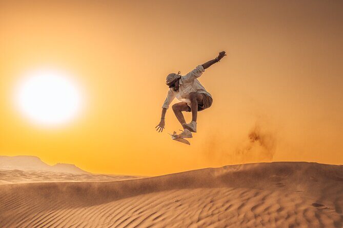 Private Sunset Desert Safari:SandSurfing, Camel Ride & BBQ dinner - Dune bashing and sandboarding: thrill with a side of timing