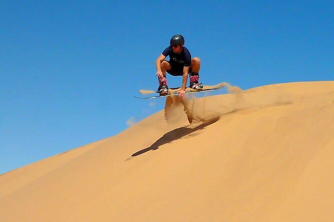 Private Sunset Safari With Extreme Dune Bashing & Camel Rides - Sandboarding: When You Want the Desert to Be a Playground