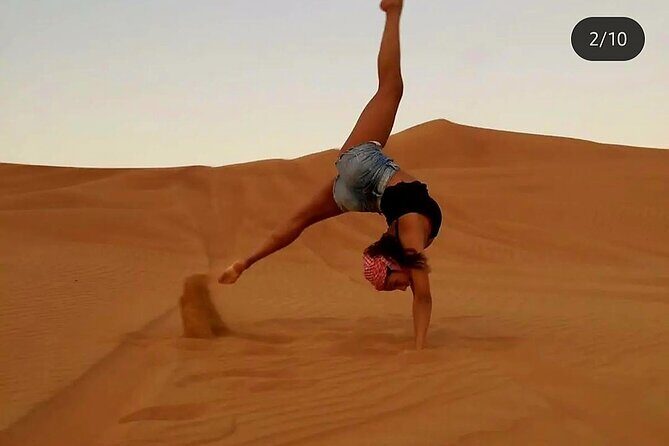 Quad Bike Dubai Desert Safari with BBQ Dinner Sandboard and Show - BBQ Dinner and the Live Show Lineup: Belly Dancing, Tannura, Fire
