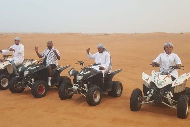 Quad Bike Dubai Desert Safari with BBQ Dinner Sandboard and Show - Lahbab Desert Stop: Quad Bikes, ATV-Style Fun, and Red-Dune Sunset Photos