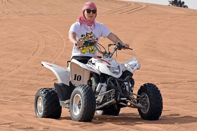 Quad Bike Tour with Camel Ride, Sandboarding, BBQ & Live Shows - Sandboarding and Camel Riding: Two Different Types of Fun