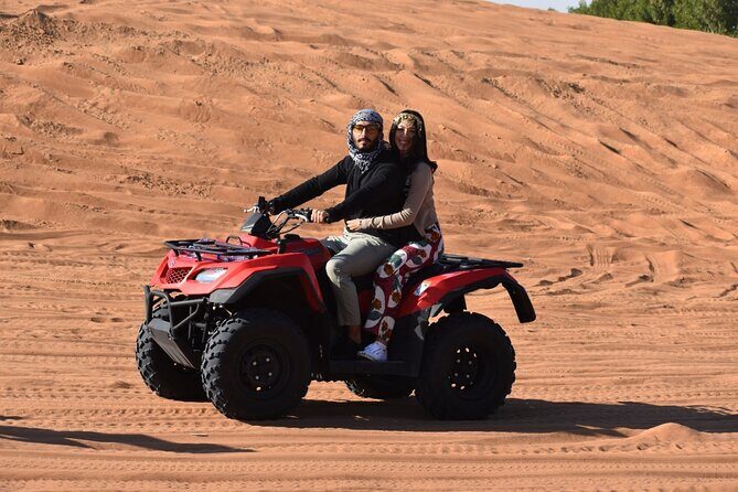 Quad Bike Tour with Camel Ride, Sandboarding, BBQ & Live Shows - Falcon Photo, Henna Art, and Sunset Moments You’ll Actually Use